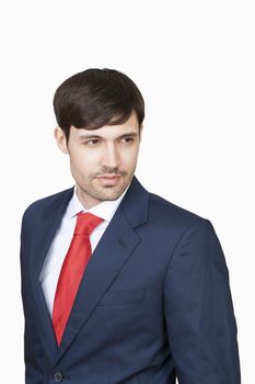 portrait of handsome business executive in suit isolated on white - clipping path