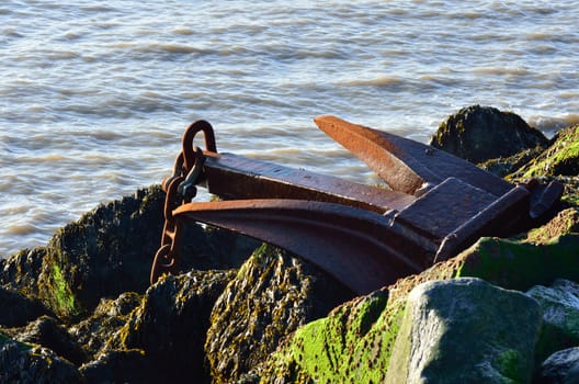 large Anchor on Rocks