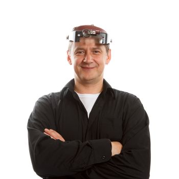 A jeweler with hismagnifying glass attached to his head