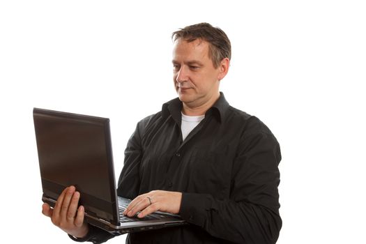 A businessman working on his portable computer