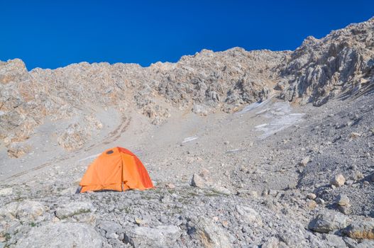 Camping in high altitudes in scenic mountains in Kyrgyzstan