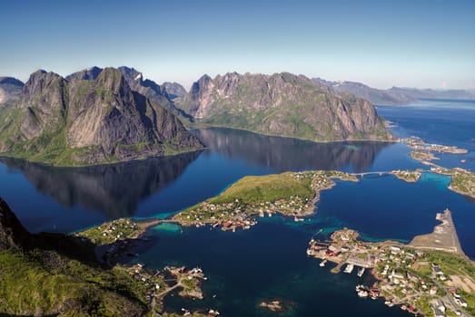 Scenic aerial view of town Reine and surrounding fjords on Lofoten islands            