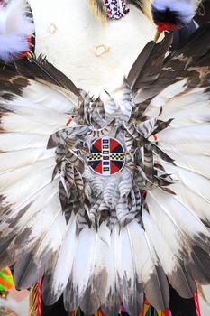 Native american indian tribal dancer performing outside.