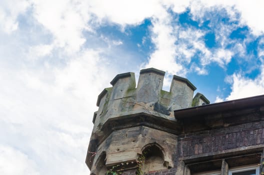 Castle tower against a beautiful blue sky.