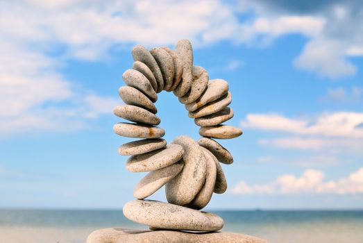 Stones laid out in the form of a circle on the sea coast