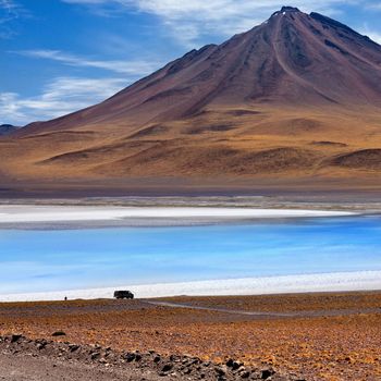 Miniques Volcano (5910m) and lagoon in the Atacama Desert in northern Chile