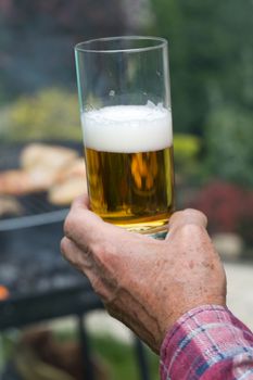 Grill  and glass of beer 