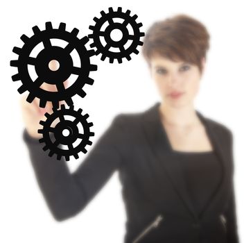 Young businesswoman with black gears isolated on white background