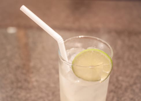 Closeup glass of ice lemon juice, stock photo