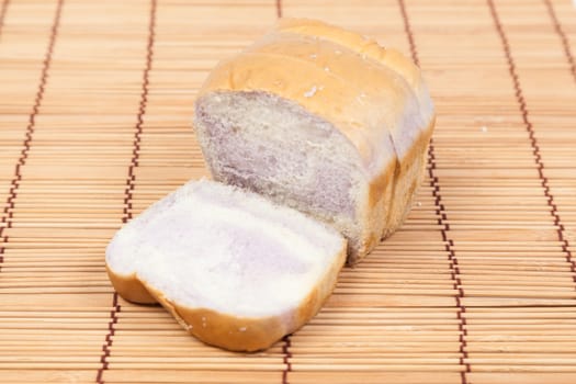 Sliced bread Placed on wood. Bread is cut into pieces evenly.