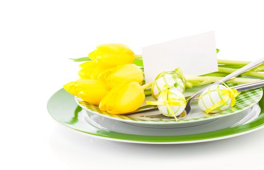 Happy Easter, easter table place setting, with sample greeting or copy space for your text here.