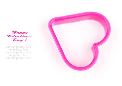 heart shaped cookie cutter on a white background