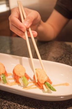 Salmon mentai sauce  on white plate, stock photo