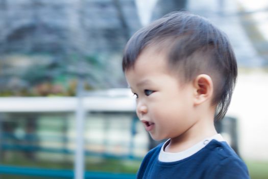 Little asian boy play at playground, stock photo