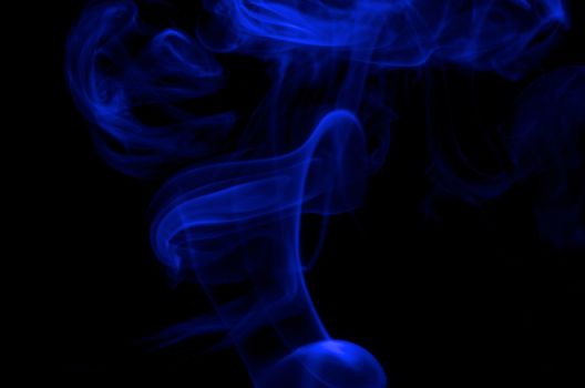 Abstract Blue Smoke Figures on Black background
