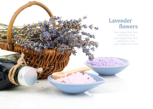 dry lavender flower in a basket with bath salt, isolated on white background