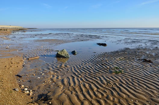 Empty beach at low tide