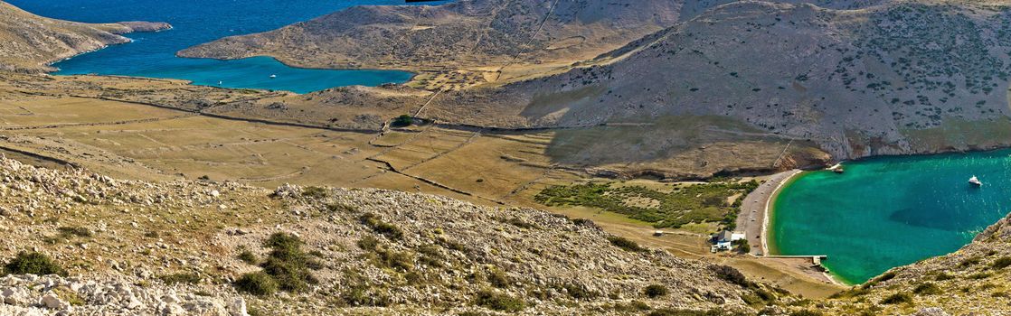 Island of Krk green and blue yachting bay, Mala luka lagoon in stone desert. Croatia