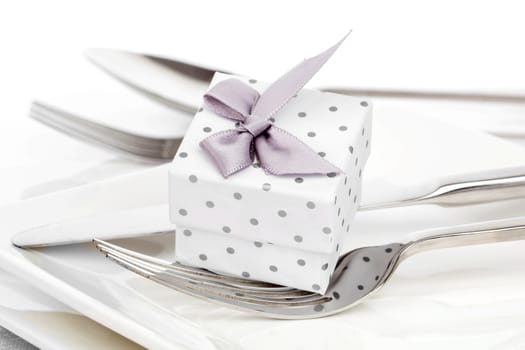 Valentines day table setting with romantic gift box,  to celebrate the holiday with a loved one