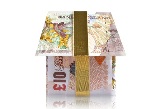 Money house made from British banknotes with gold ribbon 