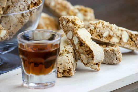 Cantucci, a tipical tuscan biscuits on a wooden table