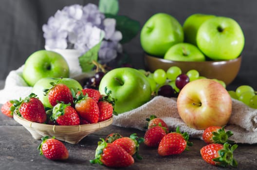 Still life with a plate full of fruit