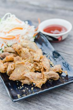 pork chitterlings fried served with chili sauce