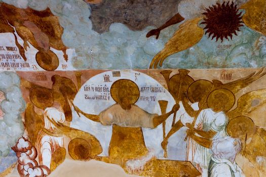 ancient fresco on a wall of church, Russia