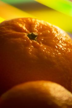 Tangerine satsuma Spanish oranges in bowl close-up photo.