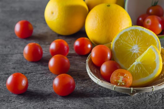 Red cherry tomatoes  and orange