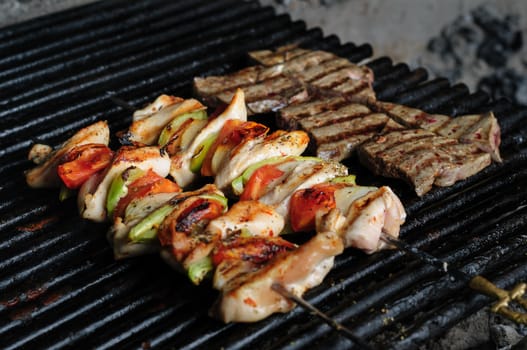 preparation of shish kebab, chicken meat skewers and beef liver