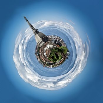 Panoramic view of Mini planet or globe of Turin city center, in Italy, in a sunny day, with Mole Antonelliana, Alps and cloudy sky around it