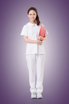 Attractive Asian nurse, woman portrait.Full length.