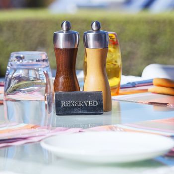 Crop of restaurant table on resort 