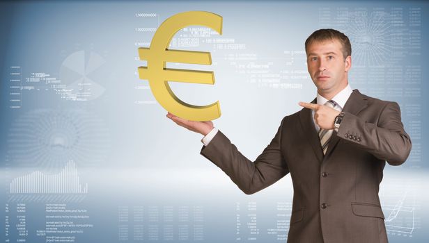 Businessman in suit holding euro sign. Graphs and texts as backdrop