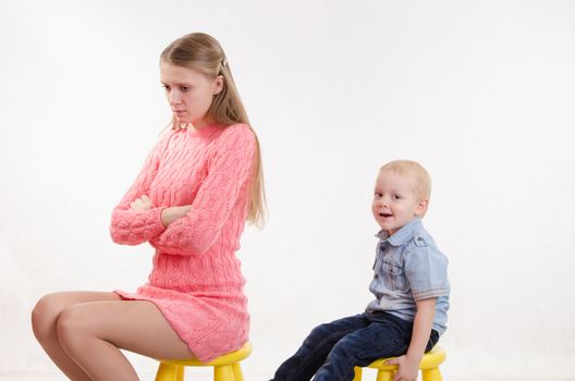 Young beautiful mother was mad at his disobedient and naughty year-old boy