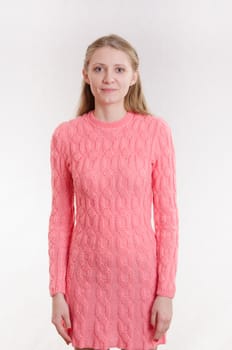 Portrait of a young emotional beautiful girl of the European appearance on a white background