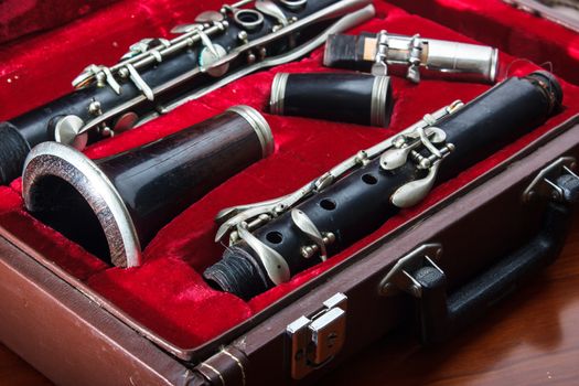 clarinet, wind instrument, disassembled and placed in the case