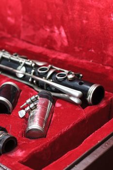 clarinet, wind instrument, disassembled and placed in the case