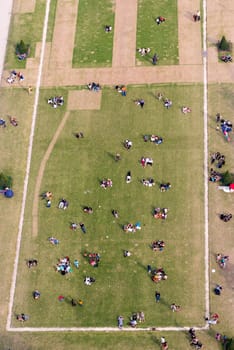 Aerial view of tourists on a beautiful garden.