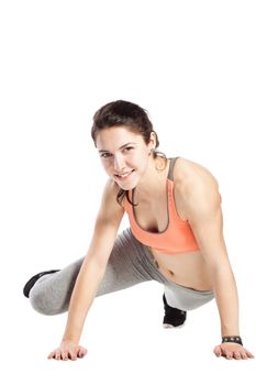 fitness girl posing against white background