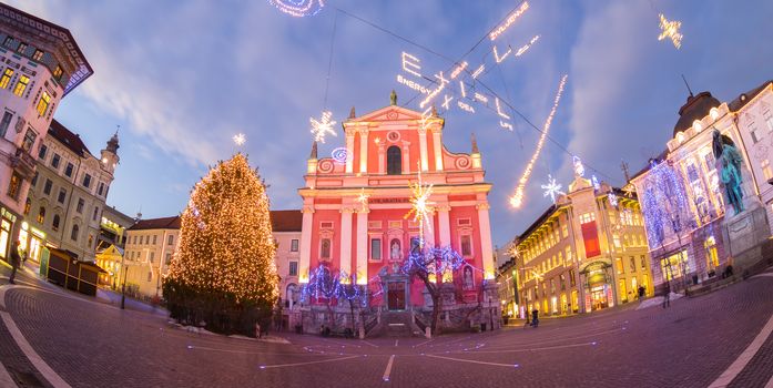 Romantic Ljubljana's city center decorated for Christmas holidays. Preseren's square, Ljubljana, Slovenia, Europe. Fish eye view of the whole square.