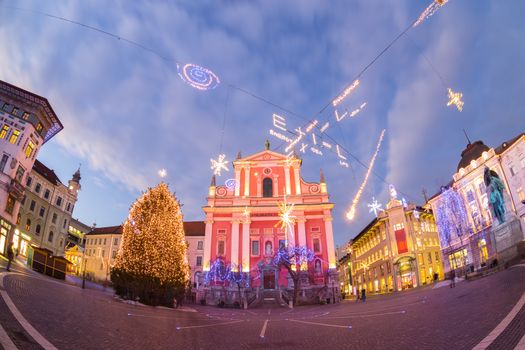 Romantic Ljubljana's city center decorated for Christmas holidays. Preseren's square, Ljubljana, Slovenia, Europe. Fish eye view of the whole square.