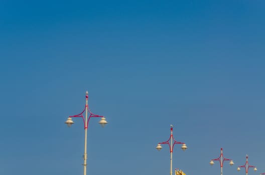 Lanterns, lamps, set on the waterfront promenade in Scheveningen, Netherlands.