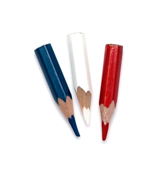 Three small used colored pencils