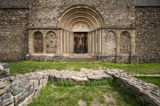 Romanesque church entrance. Cisnadioara, Romania