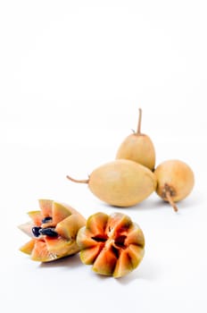 Fresh sapodillas isolated on white background