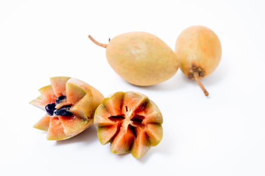 Fresh sapodillas isolated on white background