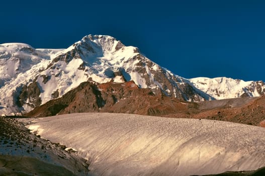 Scenic view of glacier and highest peaks in Tien-Shan mountain range in Kyrgyzstan