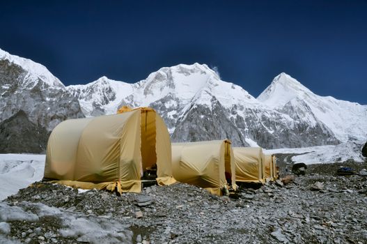 Basecamp on Engilchek glacier in scenic Tian Shan mountain range in Kyrgyzstan